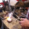 Alloyed silver being melted